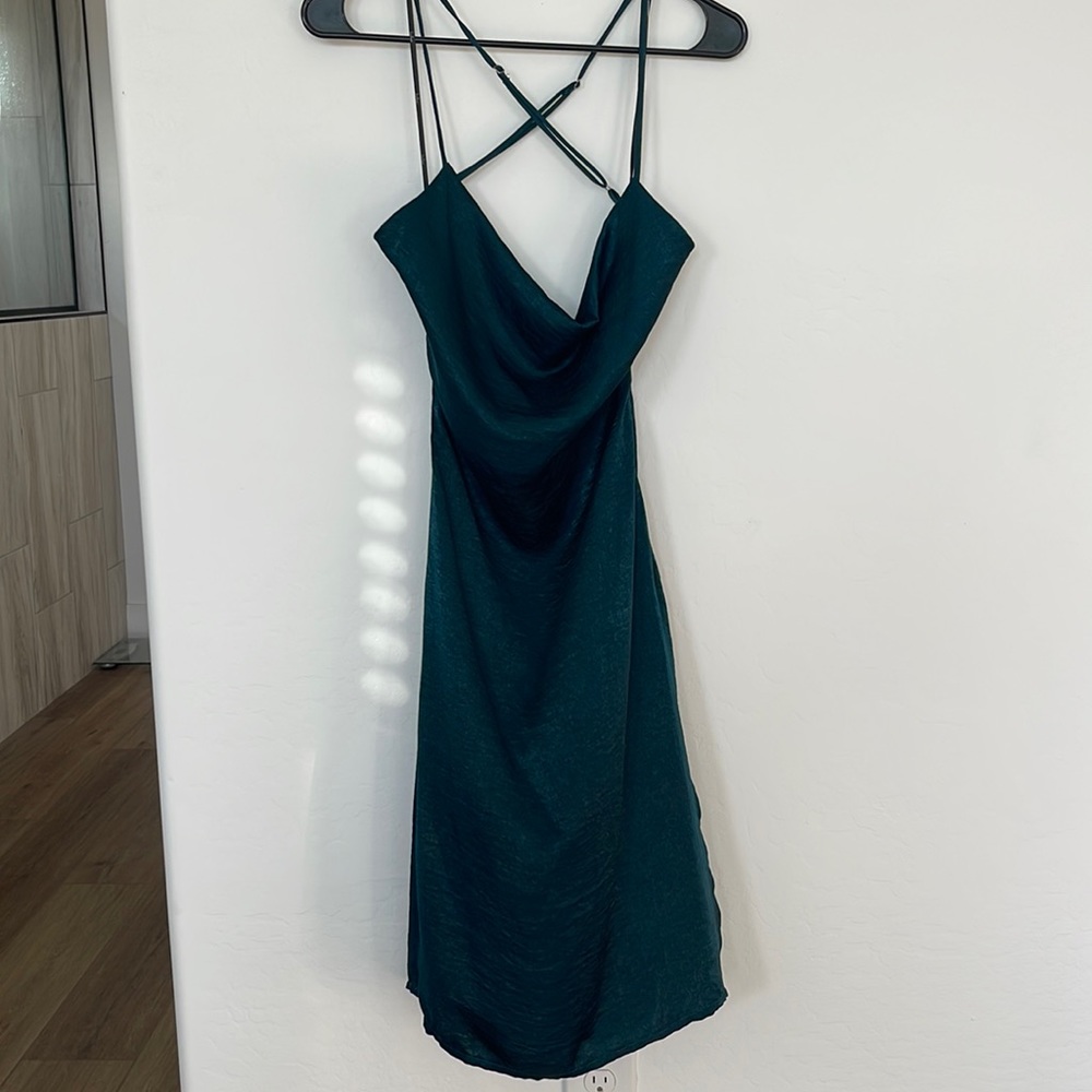 Cowl neck, satin midi dress. Scoop back, side zip closure, bottom slit